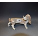 A Llandro model of a hound, 20cm wide,
