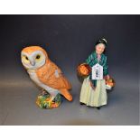 A Beswick barn owl figure; a Royal Doulton figure, The Orange Lady,