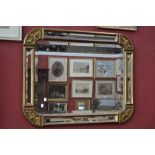 A bevel edge gilt framed wall mirror.