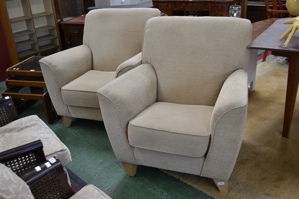 A pair of modern designer armchairs