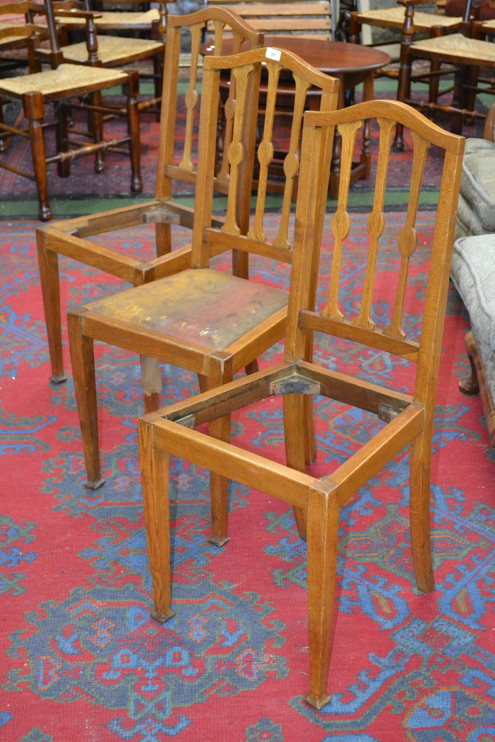 Three Arts and Crafts chairs by Ray & Miles, Liverpool.