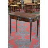 A George III mahogany D-shaped tea table C1810