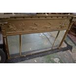 A 19th century gilt framed overmantel mirror Grecco-Roman scene of a chariot drawn by lions to