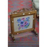 A rosewood firescreen,