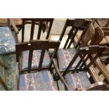 Four early 20th century oak chairs including a carver (4)