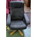 A modern leatherette recliner swivel chair