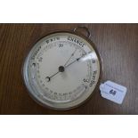 A Victorian brass cased barometer and thermometer