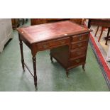 A late Victorian walnut desk, c.