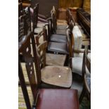 Four stained elm spindle back kitchen chairs; two 1930's lath back dining chairs;