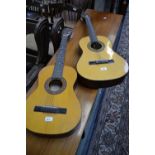 A Spanish style acoustic guitar;