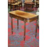 A Regency mahogany tea table, rounded angles to square top, deep frieze, reeded tapering legs, c.