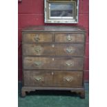 An George III oak chest of drawers, moulded top,