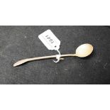 A Scottish Arts and Crafts design preserve spoon, planished overall, 16cm long,