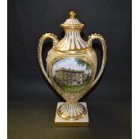 A Spode two handled pedestal baluster vase and cover, printed with a view towards Highgrove House,