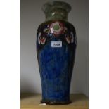 A Royal Doulton Arts and Crafts baluster vase, stylised flowe design, decorated by E Violet Haywood,