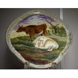 A large platter, quarter lobed, painted with cattle scene,