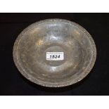 Liberty & Co - a Tudric pewter pedestal bowl, stylised scroll border, domed foot, planished overall,