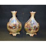 A pair of Locke and Co Worcester shaped bud vases, hand painted with coaching scenes, signed E.