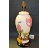 A contemporary Moorcroft Magnolia pattern baluster lamp,