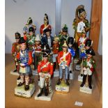 A set of Continental ceramic figures in military uniform, Cavalry, Dragoon, Highland,