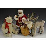 Steiff - a Christmas Coca Cola Santa Claus and toy bear, limited edition, white ear tag,