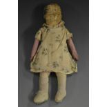 A late 18th century painted wooden and fabric doll, single piece solid head and body,