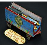 A scratch built model of a fairground trailer and Swing Boats ride,