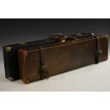 A late 19th century leather rectangular gun case,