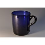 A 19th century Bristol Blue tapered cylindrical mug, quite plain, scroll handle, pontil scar,