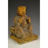 A Chinese Contemporary lacquer figure, of a seated official,