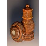 A 19th century coquilla nut circular snuff box, screw-fitting cover,