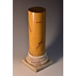 A Grand Tour type marbled column, turned marble socle and base,