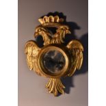 A 19th century Prussian giltwood looking glass, of diminutive proportions,