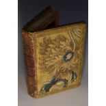 A 19th century 'disguise volume' box, formed a leather bound book,