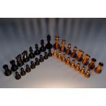 A club size boxwood and ebony Staunton pattern chess set, weighted bases, the Kings 9.