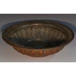 A 19th century Persian tinned copper circular rose water dish, lobed and fluted border,