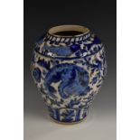 A large Middle Eastern tin-glazed ovoid jar, of Oriental influence,