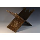A 19th century Middle Eastern Islamic hardwood folding Quran stand,