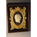 A 19th century Grand Tour marble portrait plaque, of the head of a Roman Emperor,