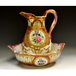 A continental porcelain wash jug and bowl, central cartouche,