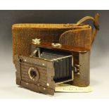 A Besdale Hawkette bakerlite bellows camera and bag