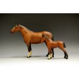 A Beswick Pony, brown matt; another Foal, printed marks,