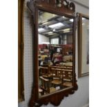 A mahogany Vauxhall mirror