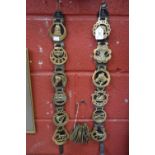 Two straps of six horse brasses and fifteen loose ones