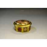 A Royal Crown Derby 1128 pattern oval trinket box and cover, solid band,