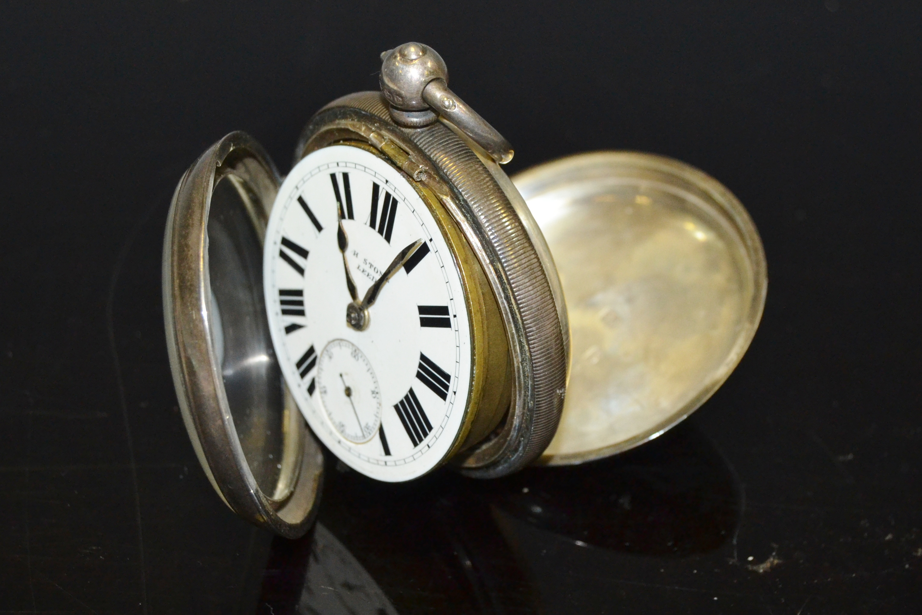 A silver pocket watch, H.