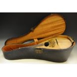 An early to mid 20th century cased Mandolin c.