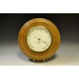 A Victorian oak aneroid barometer, by Negretti & Zambra, London, no.15571, c.