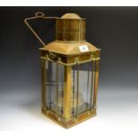 A large brass hand lantern