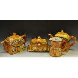 A Price Bros Cottage Ware teapot; another; butter dish;